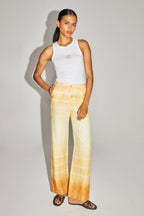 Le Pantalon Yves En Lin Aux Carreaux Tie And Dye Fabriqué En Italie