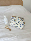trousse de toilette bébé léopard milinane