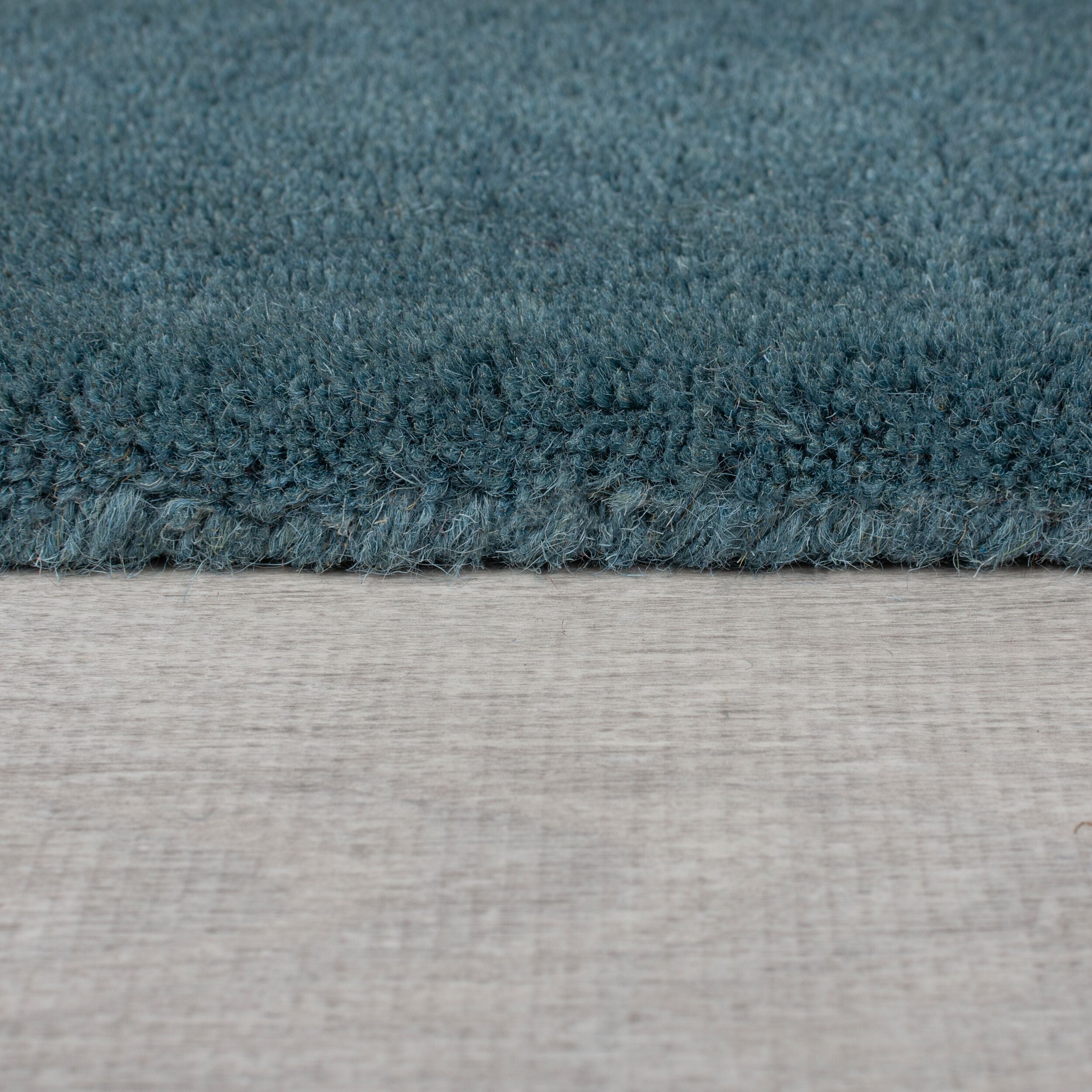 detail de la bordure du tapis shuffle #couleur_multicolore