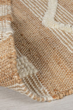 tapis medina en jute ivoire replié#couleur_beige