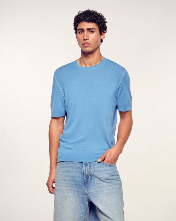 #label: Maxime mesure 1,87m et porte une taille M