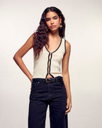 #label: Andrea mesure 1,80m et porte une taille S