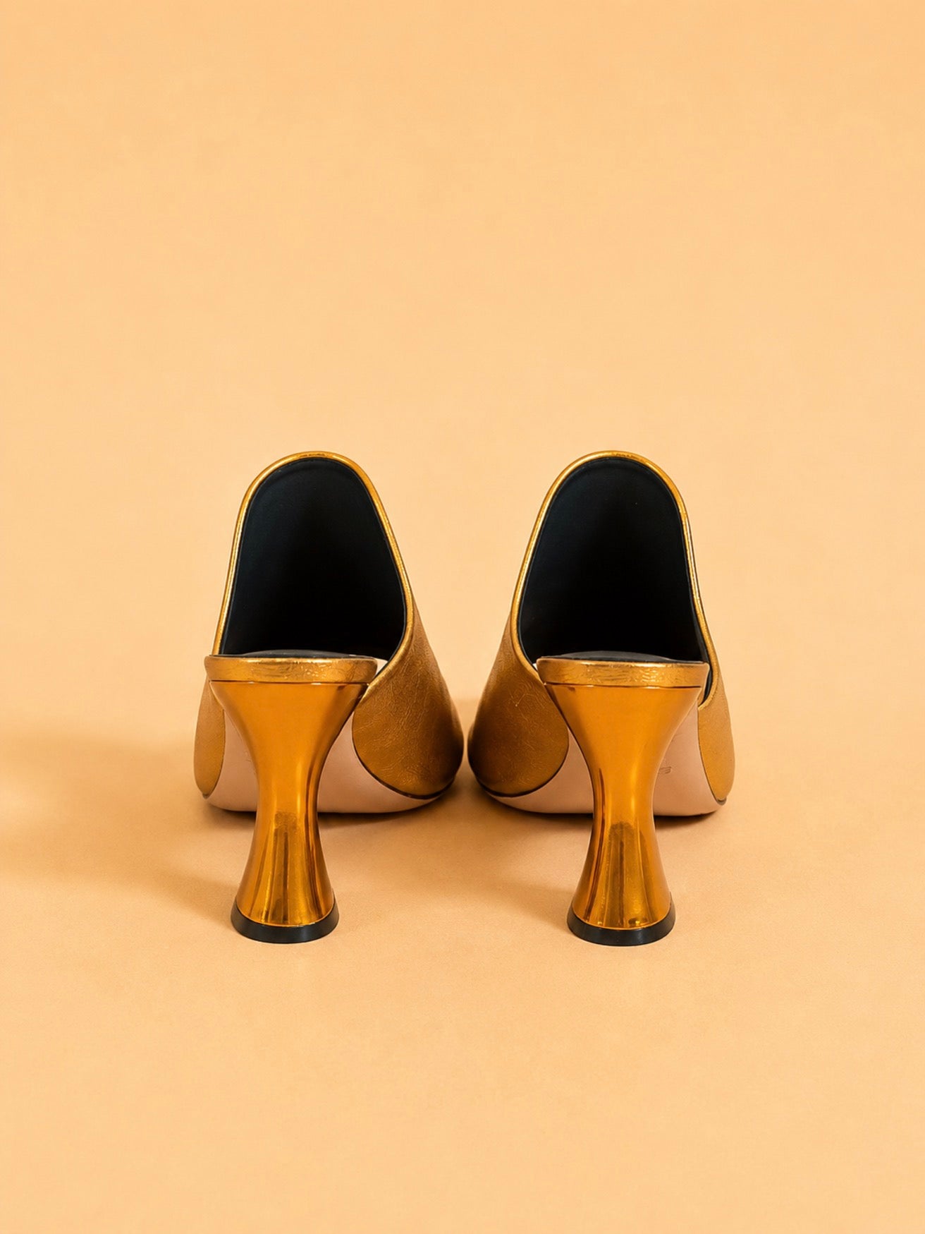 Sade Mule In Gold Laminated Lambskin