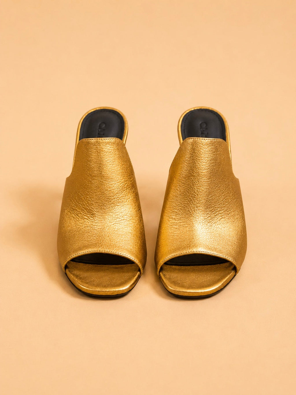 Sade Mule In Gold Laminated Lambskin
