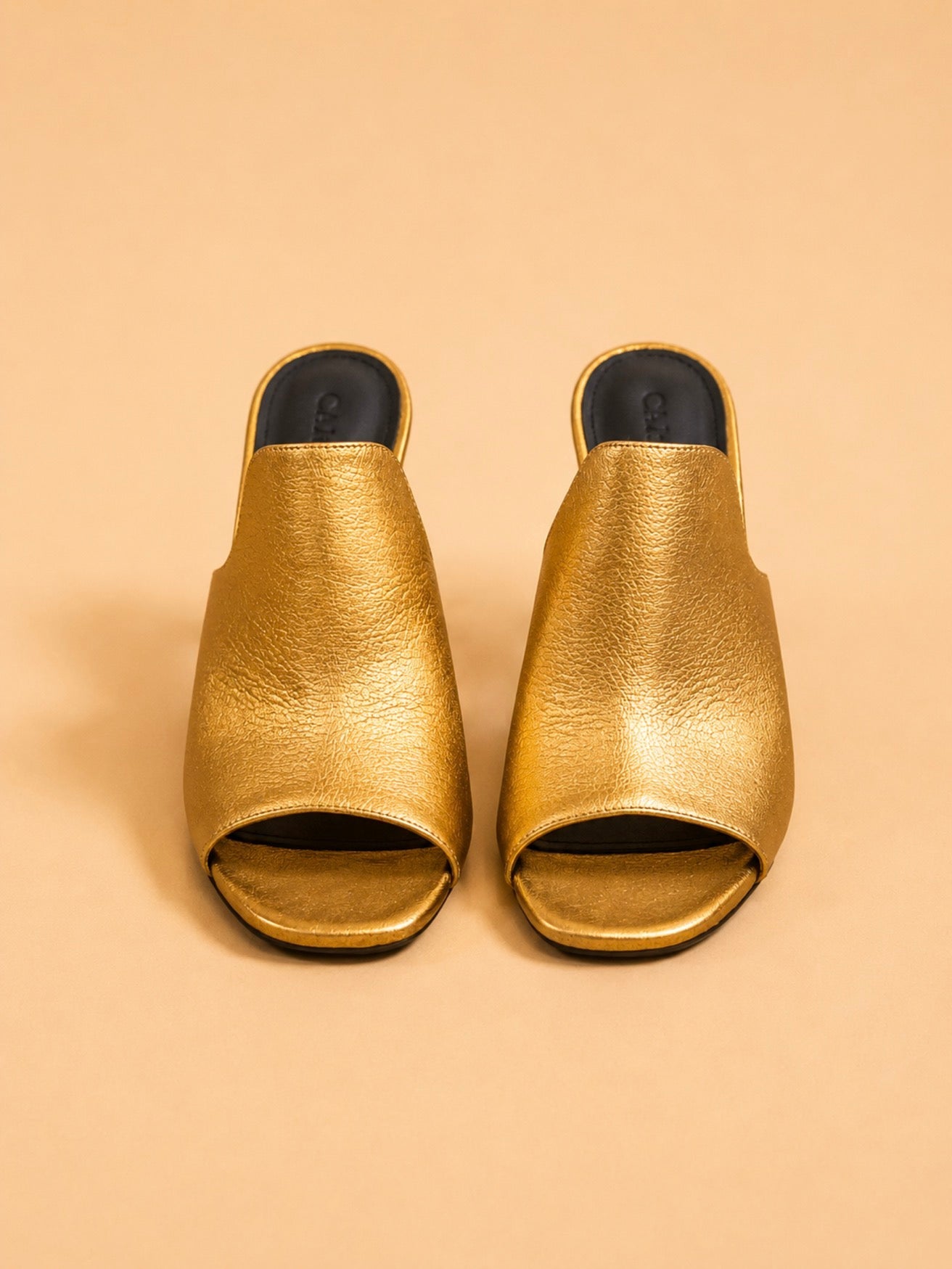 Sade Mule In Gold Laminated Lambskin