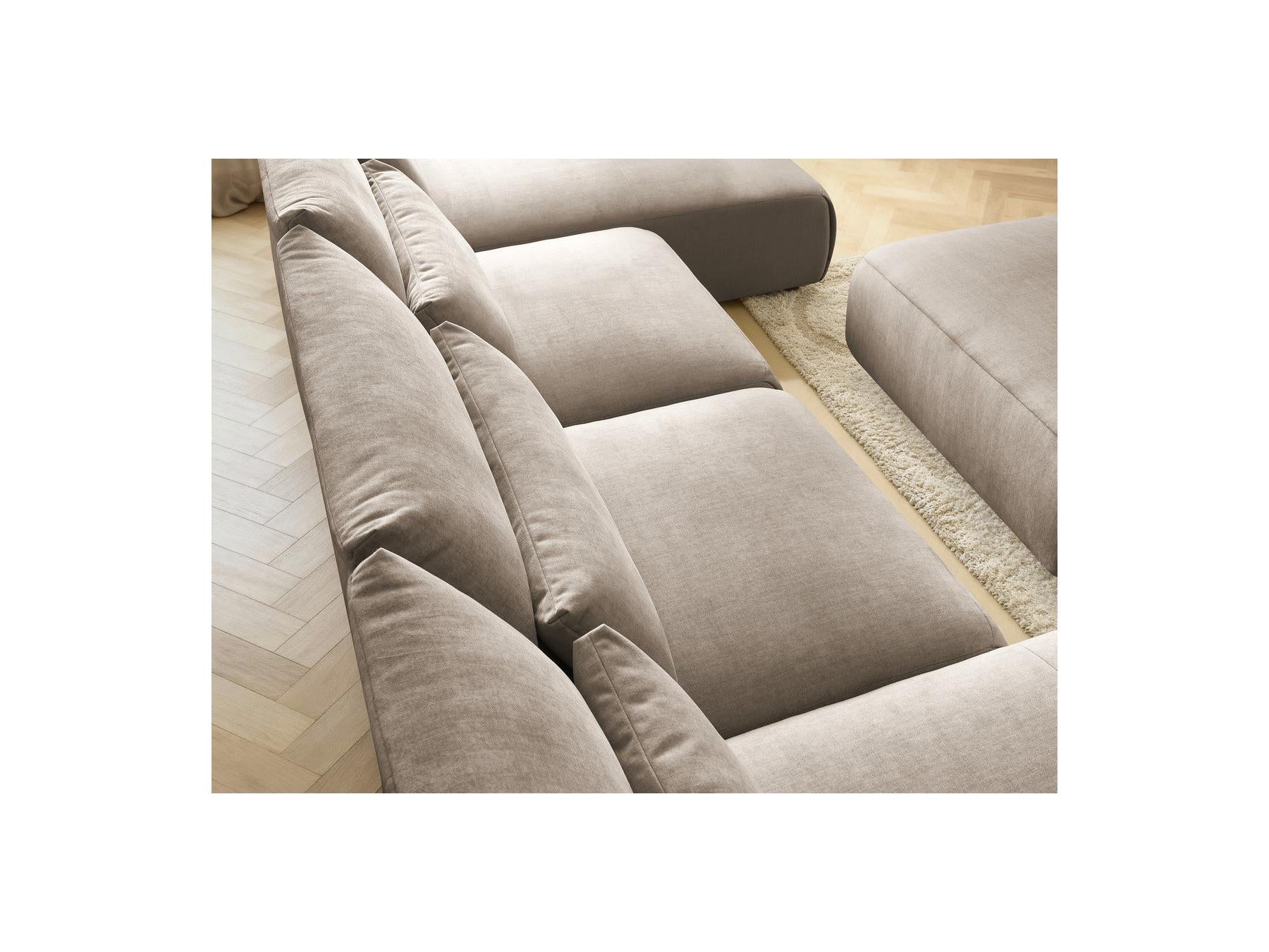 Jana - Canapé Panoramique Fixe Modulable Avec Têtières - Tissu Velours Avec 2 Méridiennes, 2 Chauffeuses Et 1 Grand Pouf