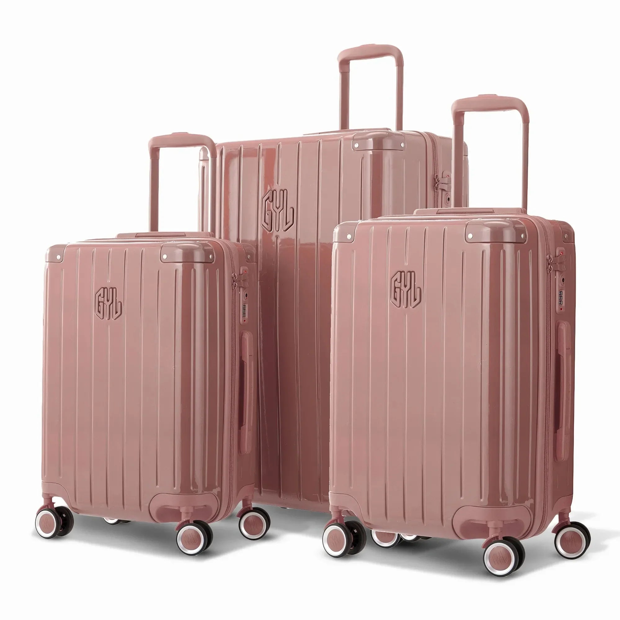 Trio de valises rigides GYL Intemporelle rose gold avec coques nervurées et poignées télescopiques.  #couleur_rose gold