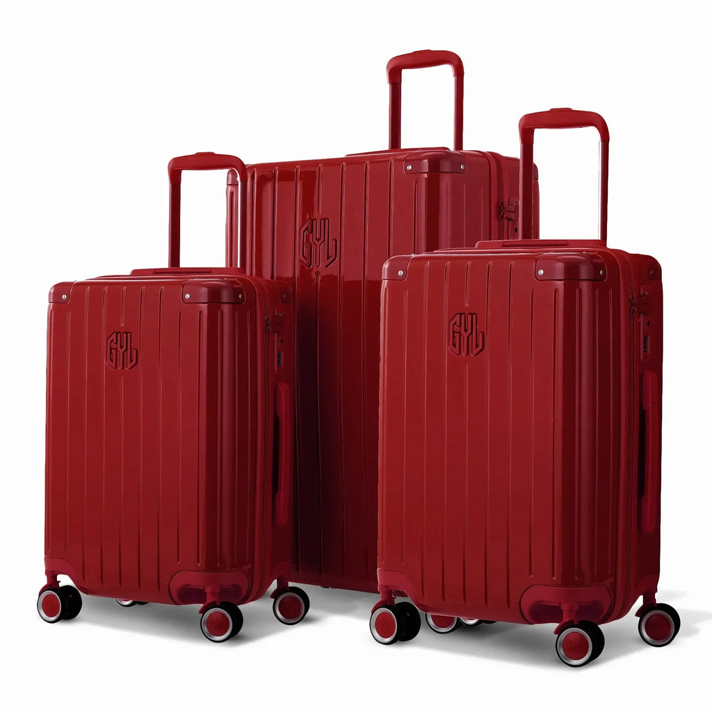 Trio de valises rigides GYL Intemporelle Rouge foncé avec coques nervurées et poignées télescopiques.  #couleur_rouge foncé