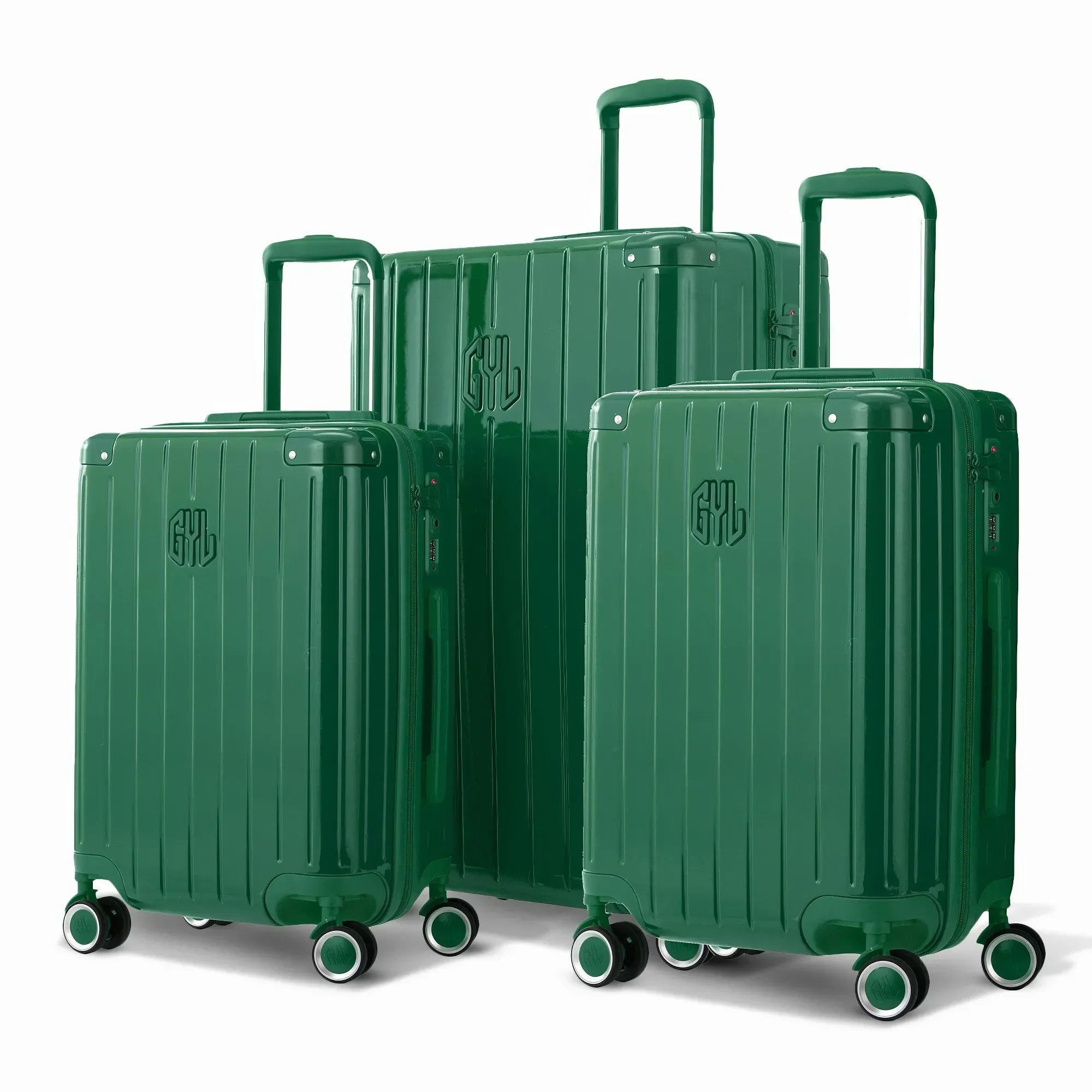 Trio de valises rigides GYL Intemporelle sapin avec coques nervurées et poignées télescopiques.  #couleur_sapin