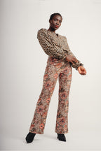 Le Pantalon Randy En Velours Tapis Fleurs Rouges