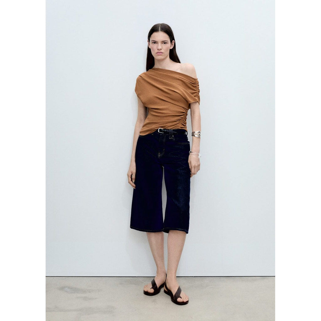 Top Asymétrique Froncé
