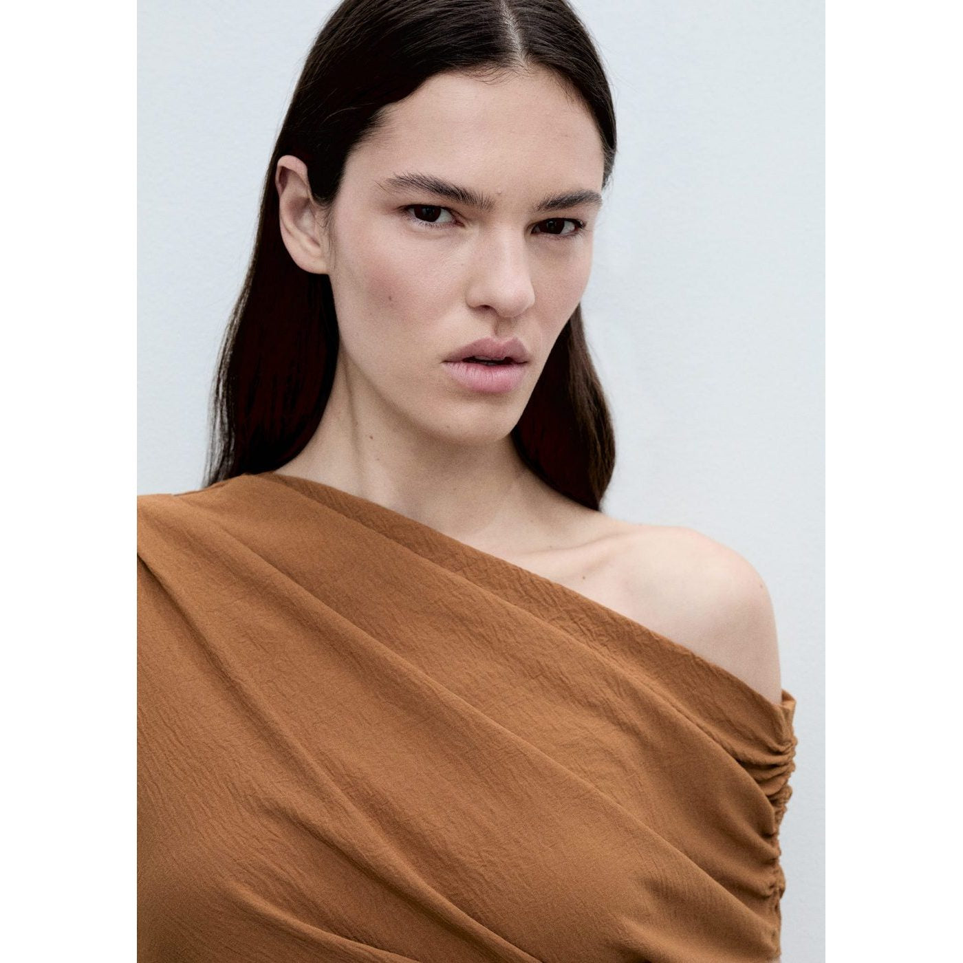 Top Asymétrique Froncé