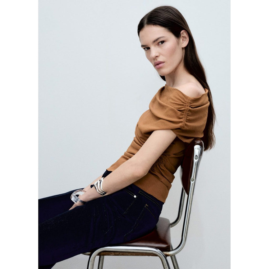 Top Asymétrique Froncé