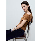 Top Asymétrique Froncé