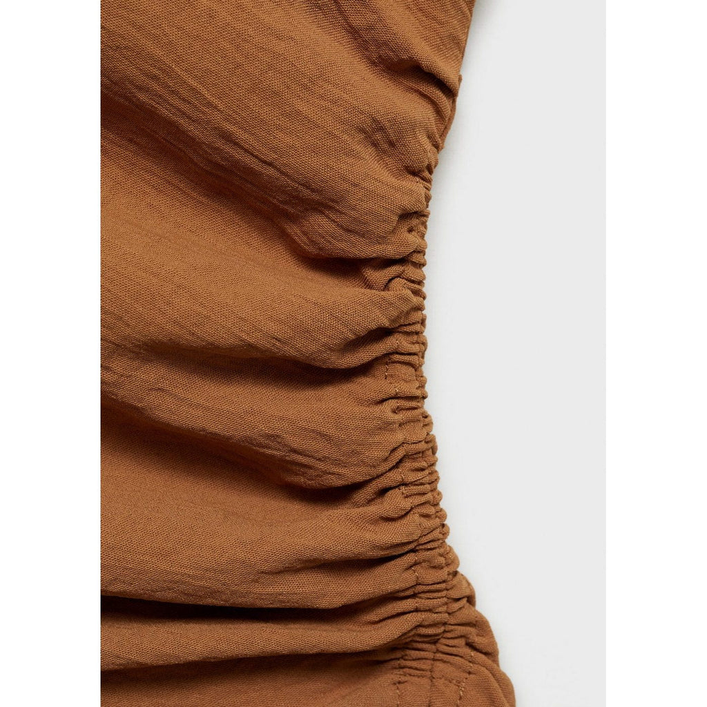 Top Asymétrique Froncé