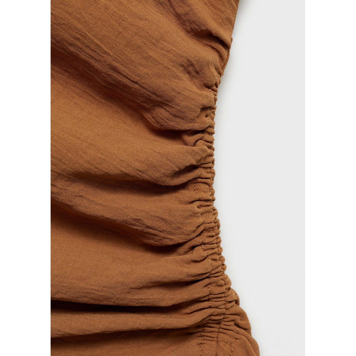 Top Asymétrique Froncé