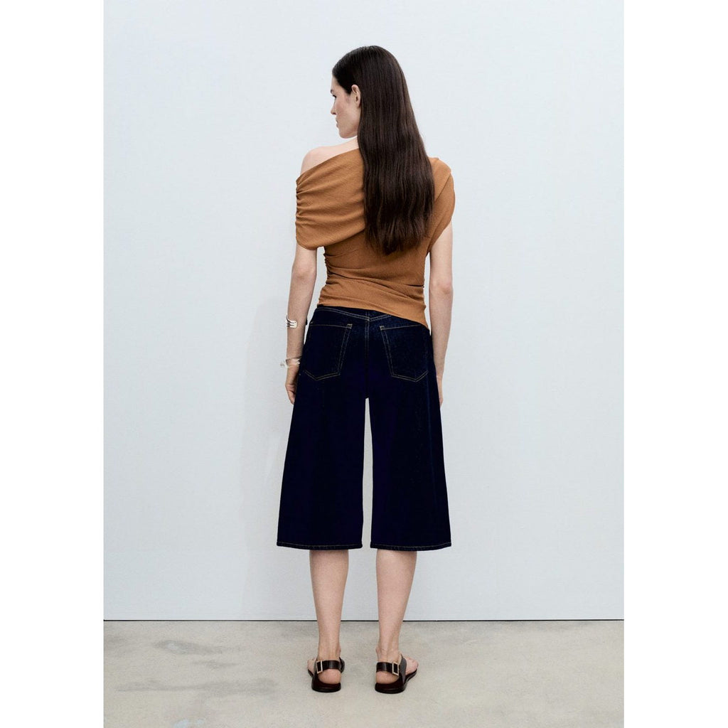 Top Asymétrique Froncé