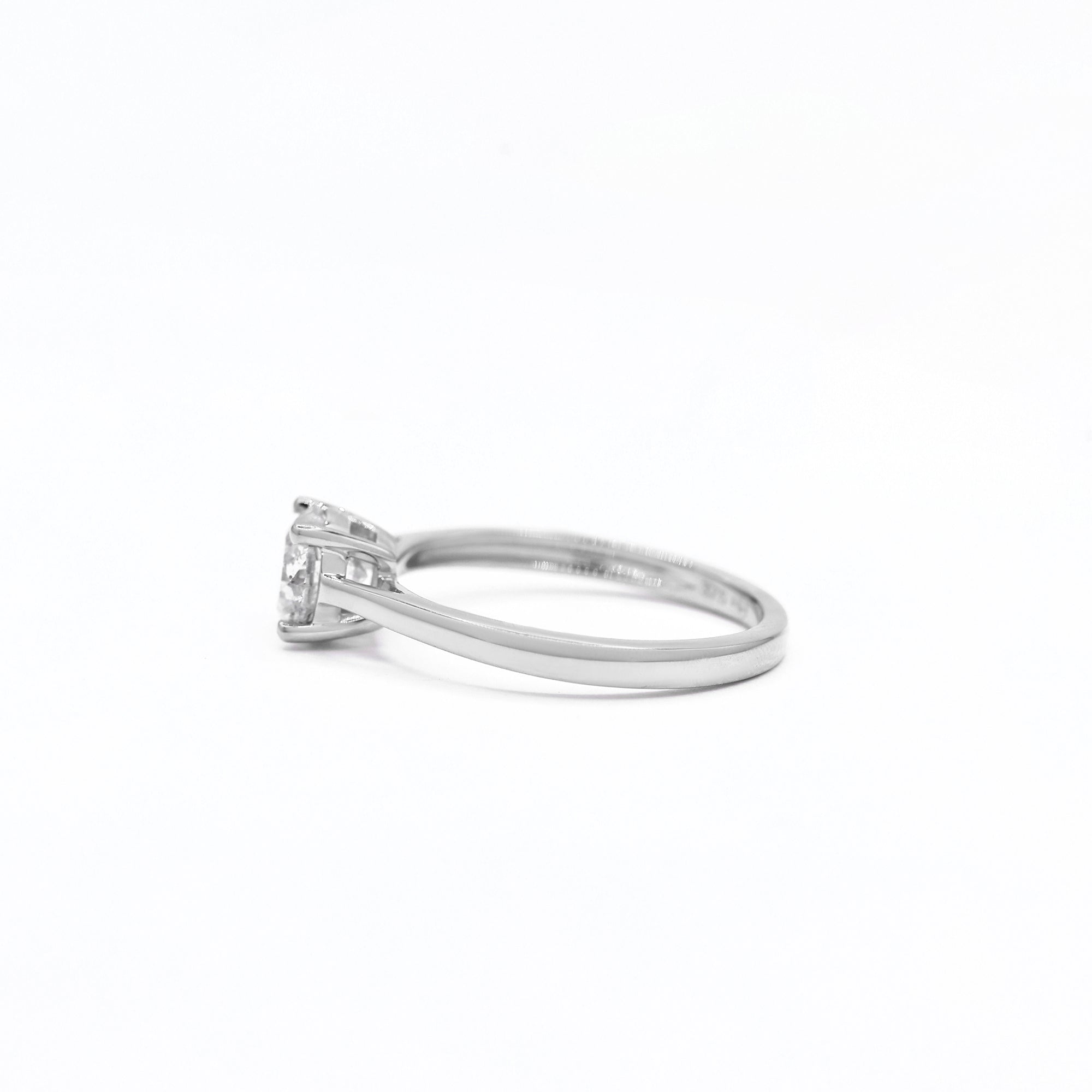 Bague Solitaire "Délicate'" D0,50/1