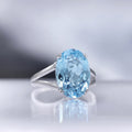 Bague "Pattaya" D0,05/2 & Topaze Bleue 6,4/1 - Or Blanc 375/1000