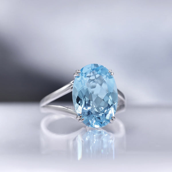 Bague "Pattaya" D0,05/2 & Topaze Bleue 6,4/1 - Or Blanc 375/1000