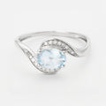 Bague "Fleur Bleue" D0,061/14; Bt1,034/1 - Or Blanc 375/1000