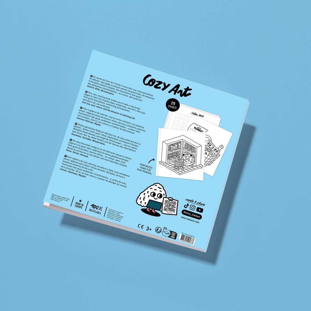 Dos du carnet de coloriage Cozy Art Supermarket par OMY – 28 pages détachables à colorier, conçu à Paris – illustration en noir et blanc de scènes de supermarché kawaii – détails produit en français et anglais, logo OMY, QR code, pictogrammes recyclables – cahier made in Europe pour enfants et adultes, dès 3 ans