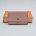 Portefeuille Louis Vuitton Capucines Compact Trifold