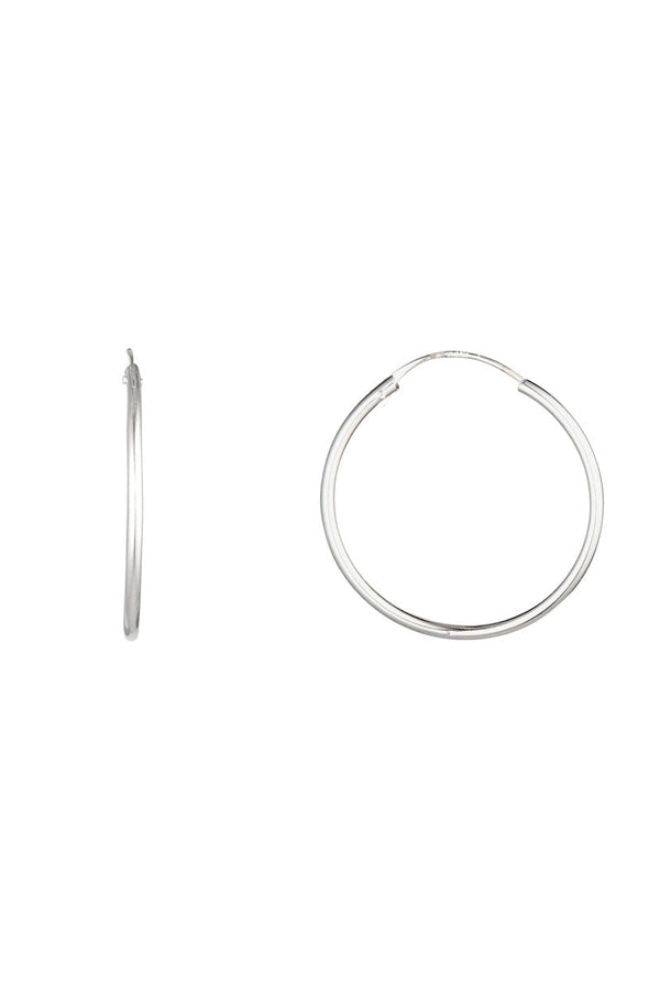 Boucles d'oreilles "Sublime créoles " 20 mm Or Blanc 375/1000