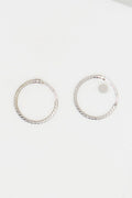 Boucles d'oreilles "Créoles twistées 10 mm" Or Blanc 375/1000