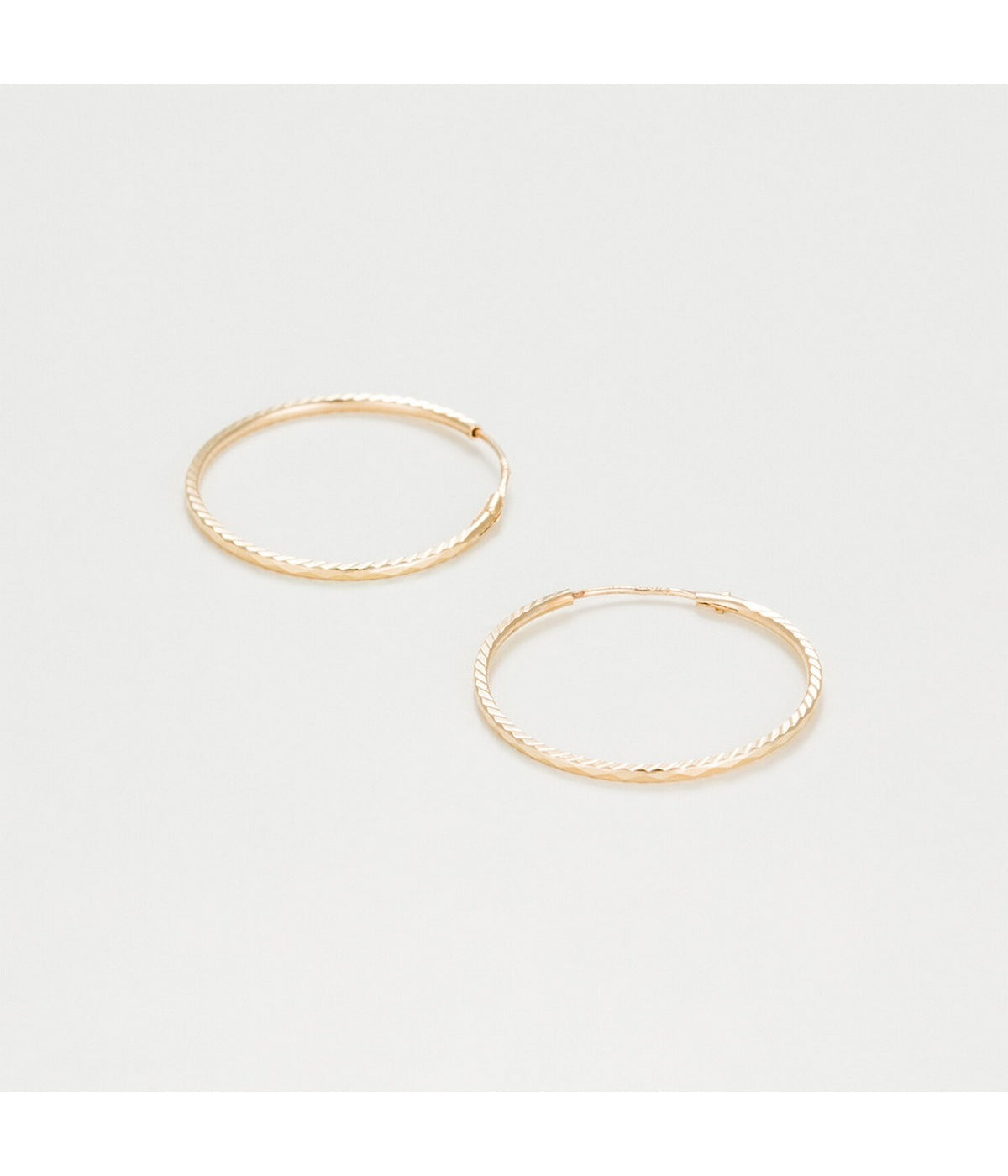 Boucles D'Oreilles "Créoles Twistées 20 Mm" Or Jaune 375/1000 - Or Jaune 375/1000