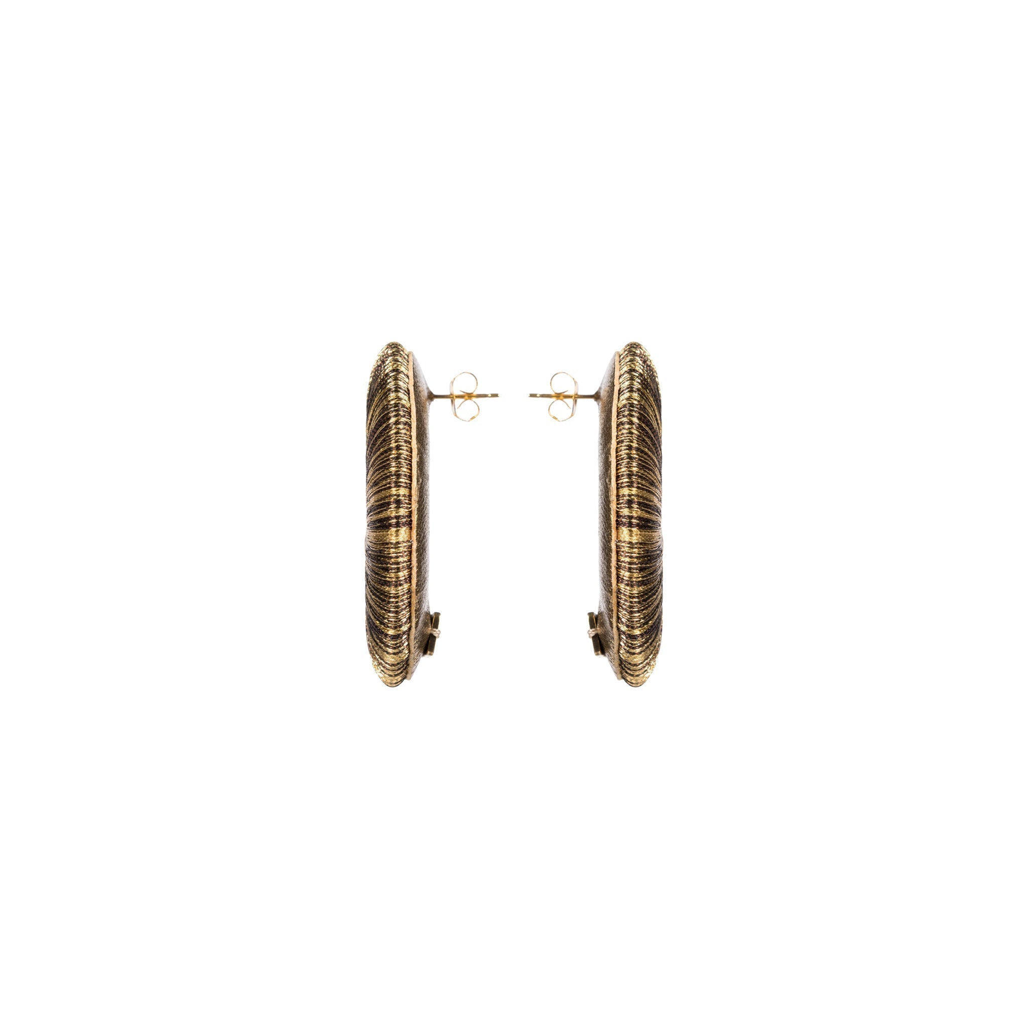 Close-up view of Boho Gold Earring showcasing intricate hand-wrapped metallic threads in circular design.