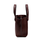 Burgundy leather in a shade of dark cherry tote bag with  an open rope handles on a white background, shown from the side.