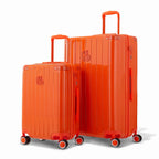 Duo de valises rigides GYL Intemporelle orange avec coques nervurées et poignées télescopiques. #couleur_orange foncé