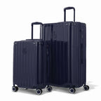 Duo de valises rigides GYL Intemporelle marine avec coques nervurées et poignées télescopiques. #couleur_marine