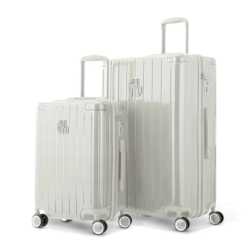 Duo de valises rigides GYL Intemporelle sable avec coques nervurées et poignées télescopiques. #couleur_sable