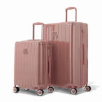 Duo de valises rigides GYL Intemporelle rose gold avec coques nervurées et poignées télescopiques. #couleur_rose gold