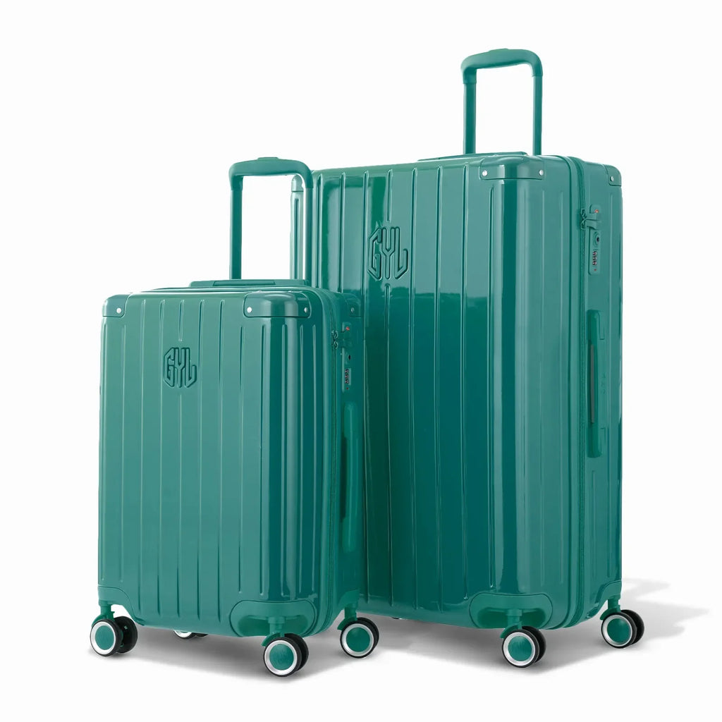 Duo de valises rigides GYL Intemporelle vert d'eau avec coques nervurées et poignées télescopiques. #couleur_vert