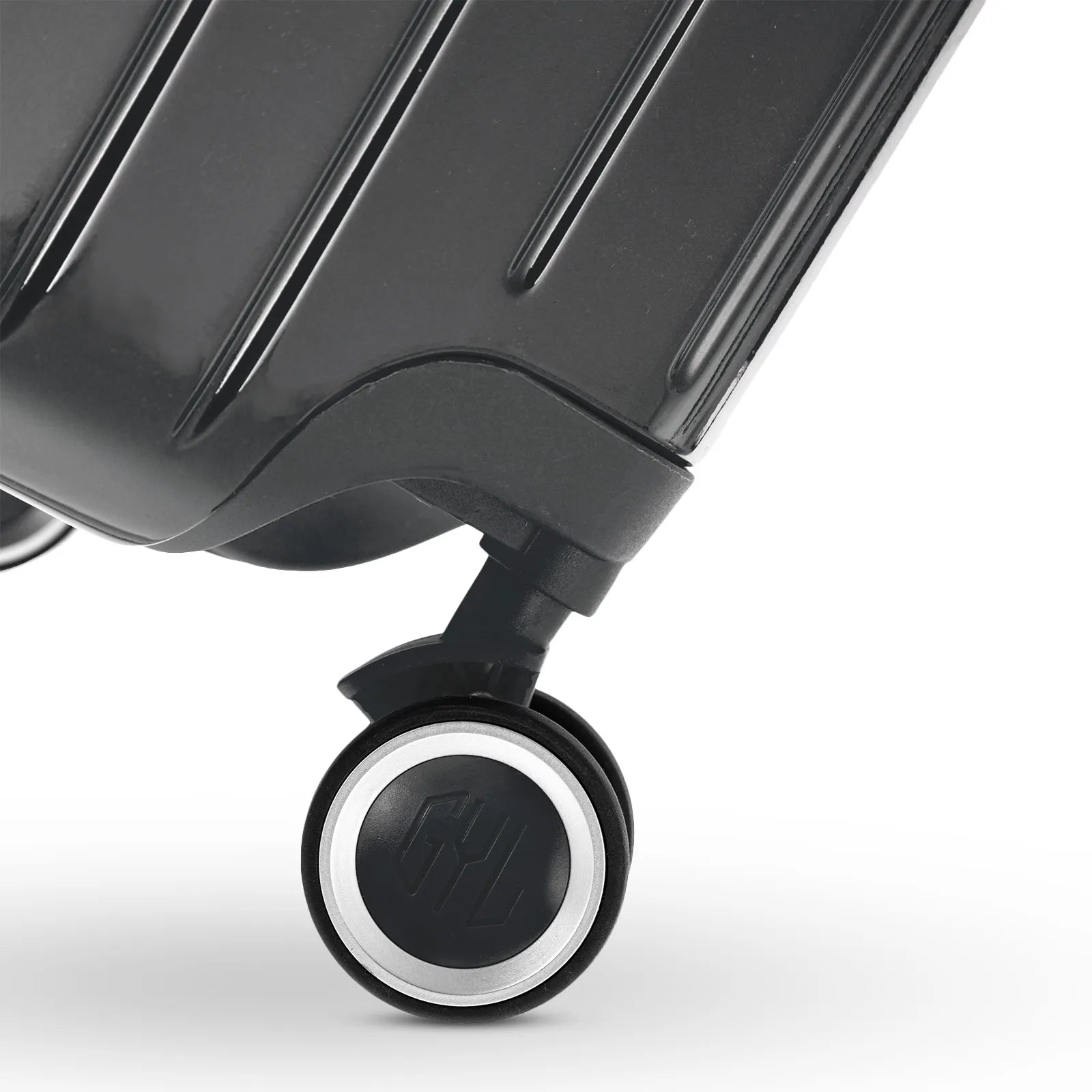 Roue double 360° de la valise GYL Intemporelle gris foncé avec gravure du logo GYL sur le moyeu. #couleur_gris foncé