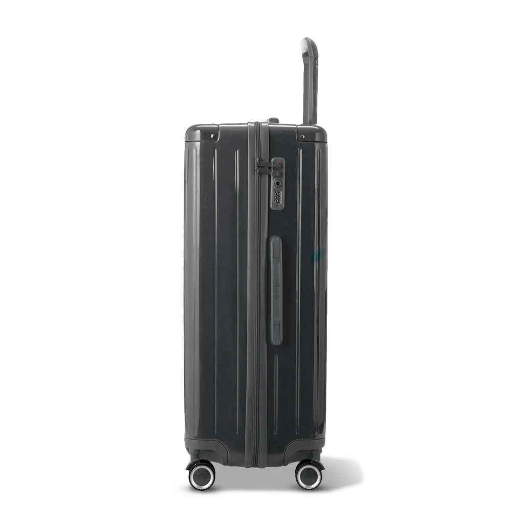 Vue latérale de la valise rigide GYL Intemporelle gris foncé avec poignée télescopique et fermeture TSA. #couleur_gris foncé