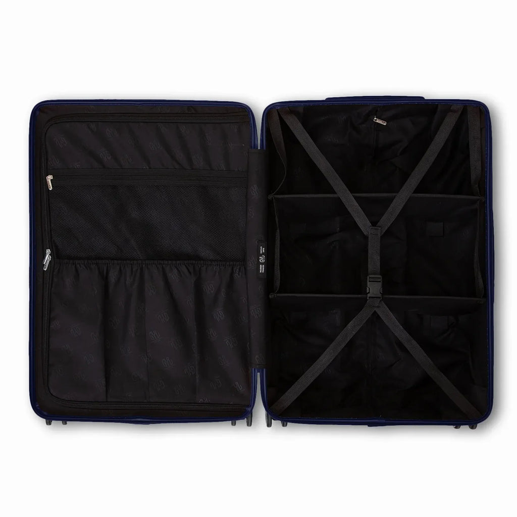 Intérieur compartimenté de la valise GYL Intemporelle marine avec sangles croisées et poches filet. #couleur_marine