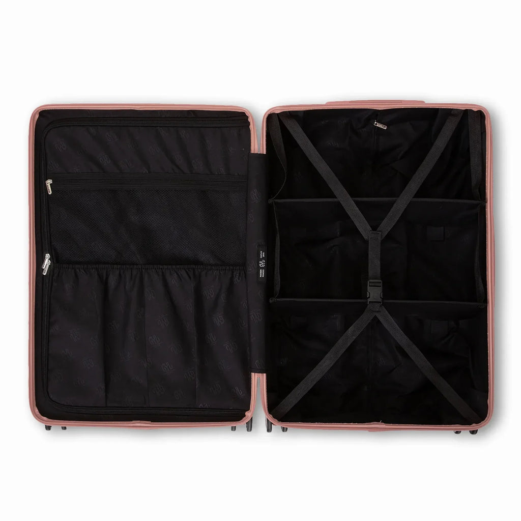 Intérieur compartimenté de la valise GYL Intemporelle rose gold avec sangles croisées et poches filet. #couleur_rose gold