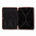Intérieur compartimenté de la valise GYL Intemporelle rose gold avec sangles croisées et poches filet. #couleur_rose gold