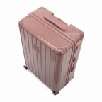 Vue en angle de la valise rigide GYL Intemporelle rose gold avec coins renforcés et coque nervurée brillante. #couleur_rose gold