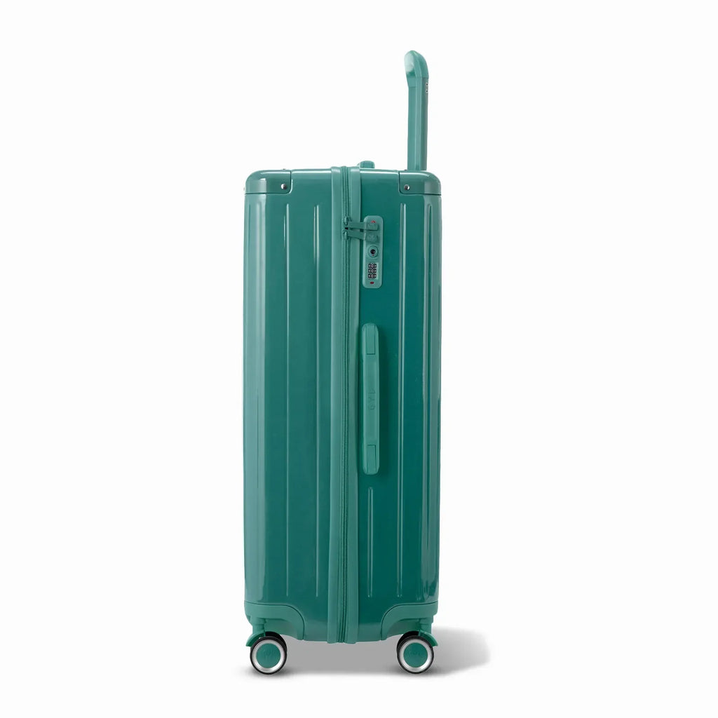 Vue latérale de la valise rigide GYL Intemporelle vert d'eau avec poignée télescopique et fermeture TSA. #couleur_vert