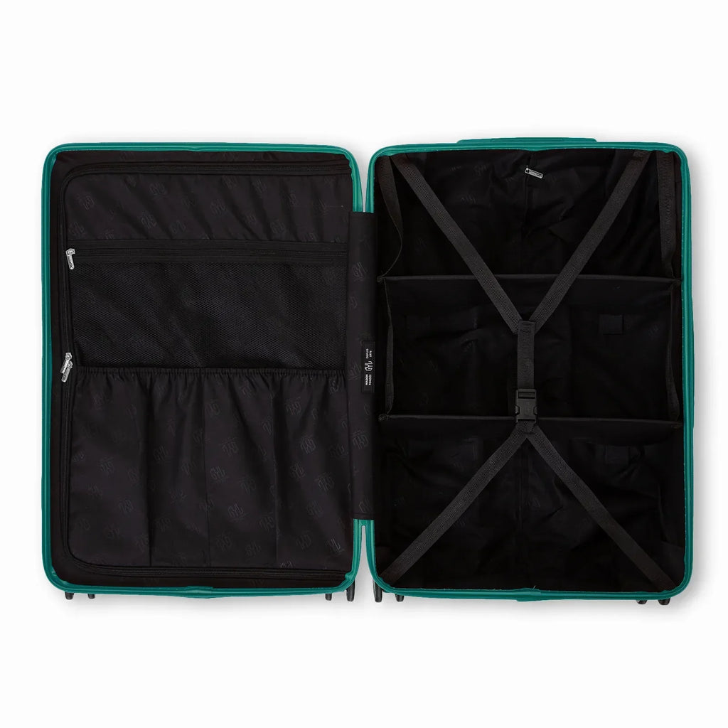 Intérieur compartimenté de la valise GYL Intemporelle vert d'eau avec sangles croisées et poches filet. #couleur_vert
