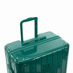 Poignée trolley télescopique GYL déployée sur la valise Intemporelle vert d'eau en polycarbonate. #couleur_vert