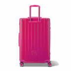 Vue arrière de la valise rigide GYL Intemporelle fuchsia avec poignées intégrées et roulettes pivotantes. #couleur_fuchsia