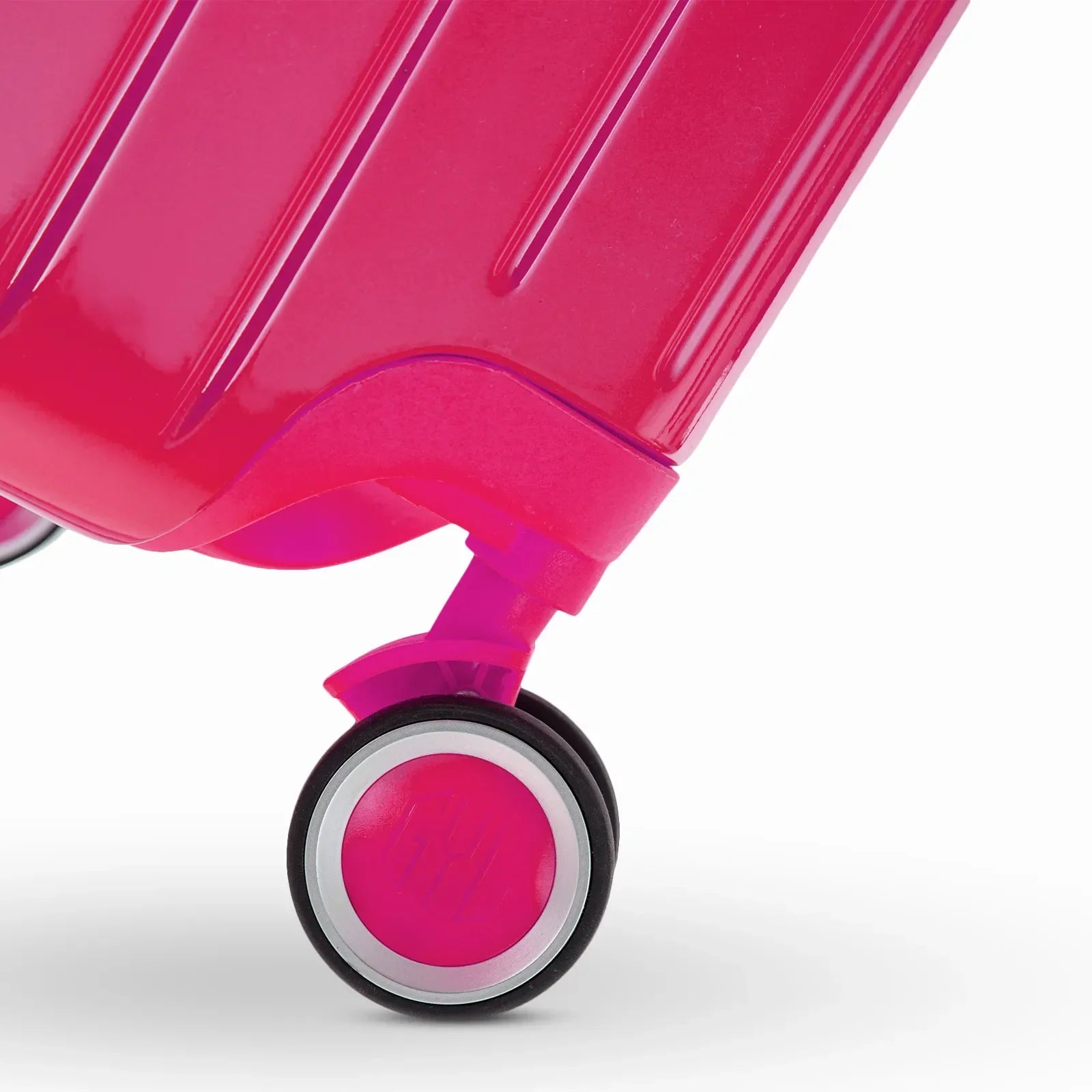 Roue double 360° de la valise GYL Intemporelle fuchsia avec gravure du logo GYL sur le moyeu. #couleur_fuchsia