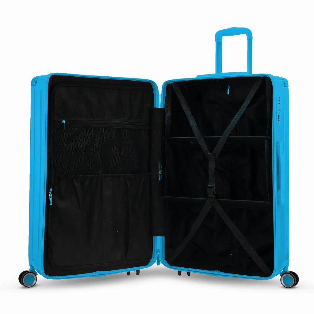 Intérieur compartimenté de la valise GYL Intemporelle menthe avec sangles croisées et poches filet. #couleur_menthe