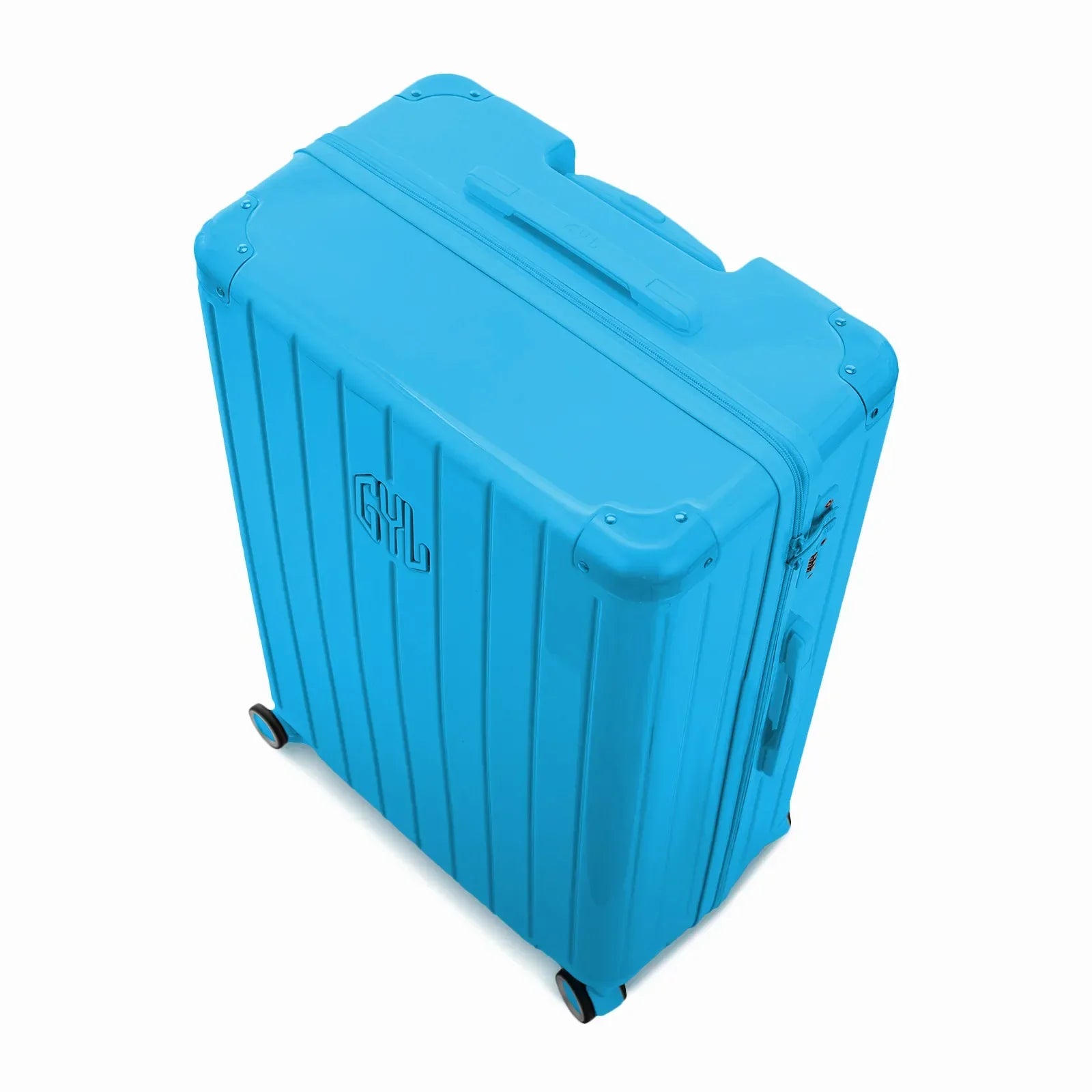 Vue en angle de la valise rigide GYL Intemporelle menthe avec coins renforcés et coque nervurée brillante. #couleur_menthe